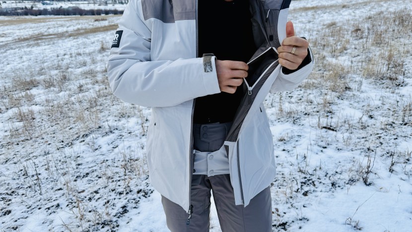 the snowcrew's interior pass-through media pocket.